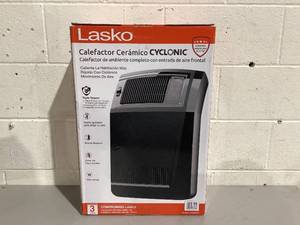 lot 546 image: Lasko 1500W Cyclonic Ceramic Console Electric Space Heater with Timer