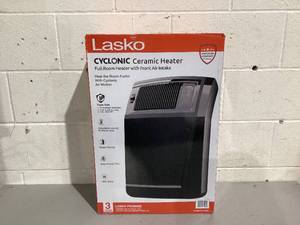 lot 570 image: Lasko 1500W Cyclonic Ceramic Console Electric Space Heater with Timer