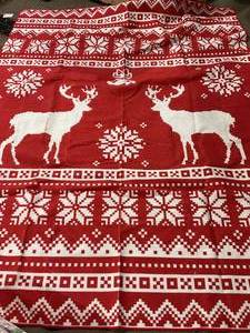 lot 471 image: Red and White Reindeer Rug