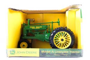 lot 99 image: ERTL John Deere Tractor NIB Model A Unstyled Tractor