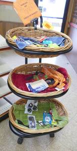lot 77 image: 3 tier basket display with goodies