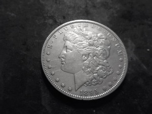 lot 21 image: 1895 O Morgan Silver Dollar