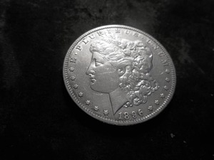 lot 24 image: 1896 O Morgan Silver Dollar