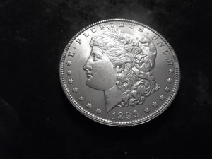 lot 31 image: 1899 Morgan Silver Dollar