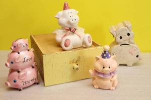 lot 14 image: Vintage Pig Piggy Coin BanksHand-Painted We Love Money Porcelain Birthday Party Inarco Trippis Inc Taiwan 1990 Etc.