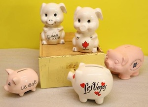 lot 23 image: Vintage Pig Piggy Coin BanksHand-Painted Porcelain Las Vegas St. Louis Missouri Canada Etc.
