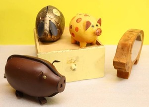 lot 38 image: Vintage Pig Piggy Coin BanksHand-Crafted Leather wPadlock Wood Ceramic Plastic Coins Citizens State Bank Olivia Minnesota