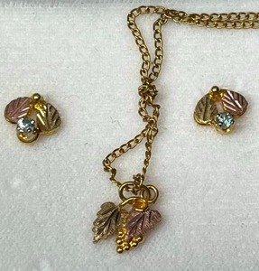 lot 13A image: Vintage Black Hills Gold Leaf Pendant Necklace and Blue Topaz BHG Leaf Pierced Earrings...