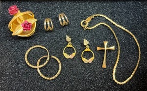 lot 7A image: Collectible Gold Jewelry & AccessoriesBallou Regd Gold Cross Pin Brooch, 6 Gold Bracelet, Black Hills Gold Fruit Hoop 3-Band Earring, 1 Gold Metal Basket of Roses