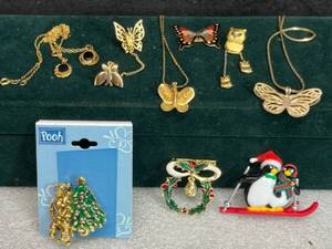 lot 9A image: Collectible Gold-Tone Jewelry14 and 24 Gold Butterfly Necklace, Tangled Black Oval & Teardrop Necklaces, Cloisonn Black Butterfly, OwlButterfly Brooch, Christmas Pooh Penguin Wreath Brooch