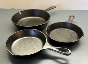 lot 83 image: Three Cast Iron Lodge Skillets  Pans