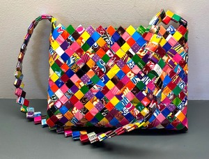 lot 87 image: Woven Wrapper Handbag