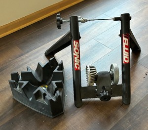 lot 234 image: Two Bicycle Trainers by Cycle Ops and Sonic Fluid