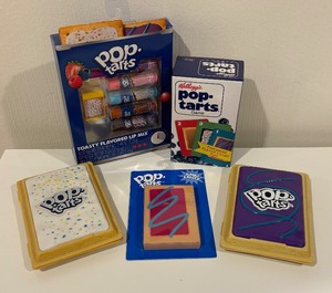 lot 306 image: Pop-Tart Lip Mix, Game, Jumbo Eraser and More