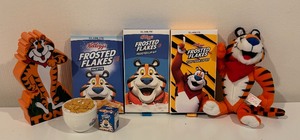 lot 319 image: Frosted Flakes Lip Kits, Eyeshadow Set, Plush Toy, Radio and More
