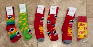 lot 350 image: Six New Pairs of Pringles Chips and Eggo Waffle Motif Socks