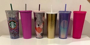 lot 351 image: Six Starbucks Tumblers including Starbucks Glitter Hearts Cup - Valentines Day 2021