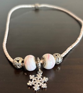 lot 383 image: Pandora White Braided Necklace with 5 Winter Charms