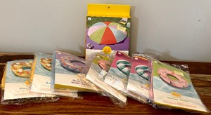 lot 389 image: Its Pool Time Seven Inflatable Swim Tubes and Giant Parachute Game