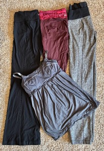 lot 170 image: Three Pairs of Lulu Lemon Leggings and Lulu Tank Top