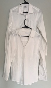 lot 162 image: Two Womens Untucked Crisp White Button Down Shirts