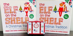lot 242 image: Girl and Boy Elf On The Shelf Toys including Assortment of Outfits