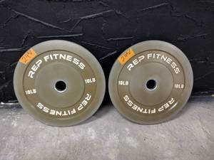 lot 24 image: (2) Rep Fitness 10lb Bumper Plates
