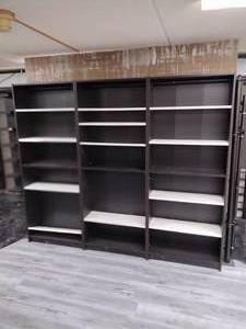 lot 82 image: (3) Bookshelves with adjustable shelves. Measures 31.5 L x 11D x 79.5H