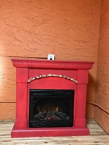 lot 35 image: Electric Fireplace with a red surround and mantle, Twin Star 23E05,  Powers Up