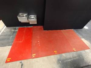 lot 97 image: (4) Red floor mats. Measurements approx 63 x 39 and 79 x 34