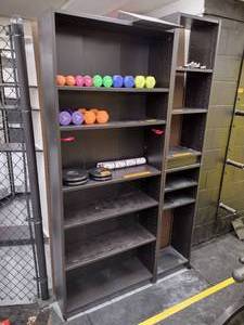 lot 107 image: (2) Black shelves H79  x L 31  D 10   and 16L x 10.5 D x 84 H. (items on shelves not included) Bring help to move
