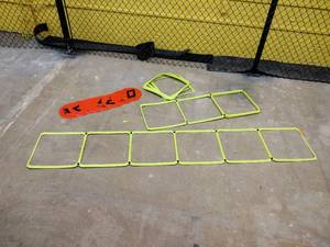 lot 108 image: Green agility ladder and circle floor markers