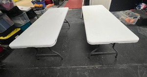 lot 96 image: (2) six-foot folding Lifetime tables Model 80272