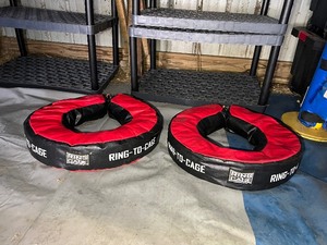 lot 58 image: (2) Ring to Cage punching bag upper cut ring donuts