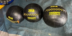 lot 65A image: (3) Toughfit weighted balls 15, 20 & 25 lb
