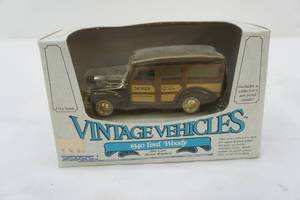lot 29 image: Die cast metal replica 1940 Ford Woody 143 scale