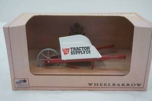 lot 30 image: Spec Cast die cast wheelbarrow (7 long)
