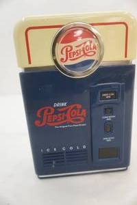 lot 33 image: Pepsi toy plastic bank, 1996