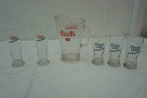 lot 51 image: Coors Silver Bullet lot of beer glasses and pitcher