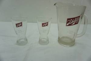 lot 52 image: Schlitz pitcher and two beer glasses