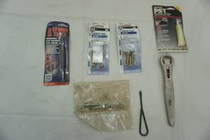 lot 65 image: Shear pins, Skil adjustable wrench and other
