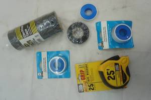 lot 71 image: Various tapes, electrical tape and Stanley tape measure