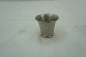 lot 92 image: Silver shot glass John Kennedy 10 year commemorative coin