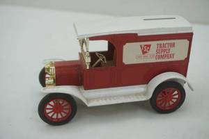 lot 123 image: Ertl 1917 Ford Model T Van. Coin Bank with Key.