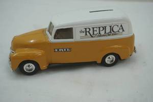lot 126 image: Ertl The Replica Collectors Club News. Coin Bank.