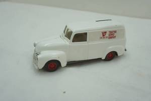 lot 130 image: Ertl Tractor Supply Co. Coin Bank.
