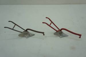 lot 135 image: Tractor Supply Co. One Bottom Plows. Collectors Corner