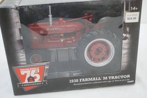 lot 145 image: Ertl 1938 Farmall M Tractor. Case IH.