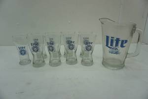 lot 147 image: Miller Lite glassware pitcher and glasses