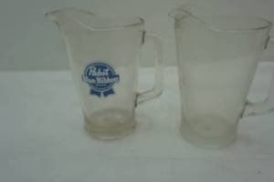 lot 156 image: 2 pitcher collection Pabst Blue Ribbon, and clear